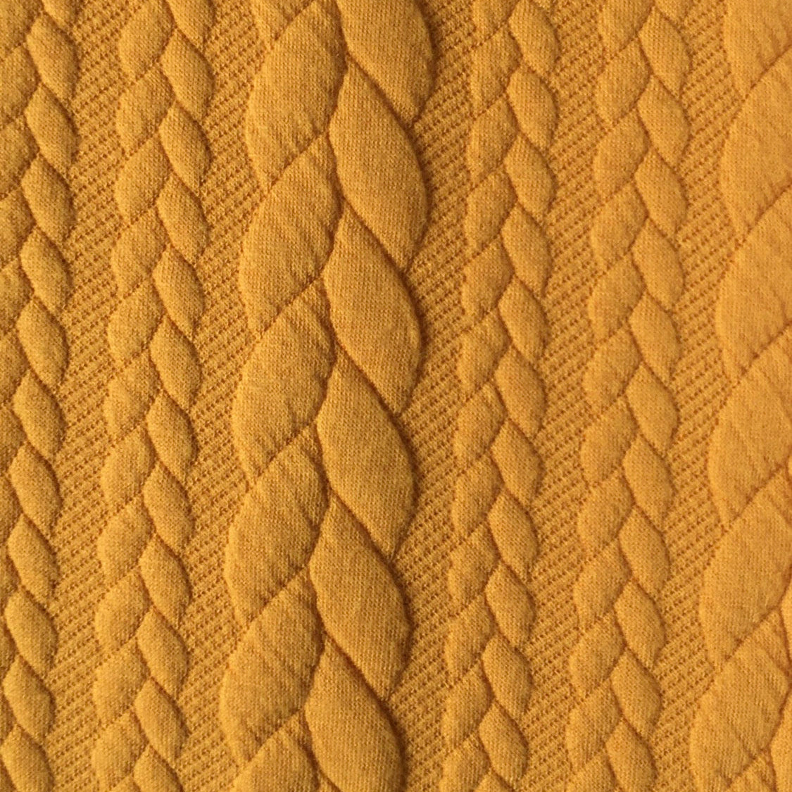 Yellow polyester and elastine cable knit image 0