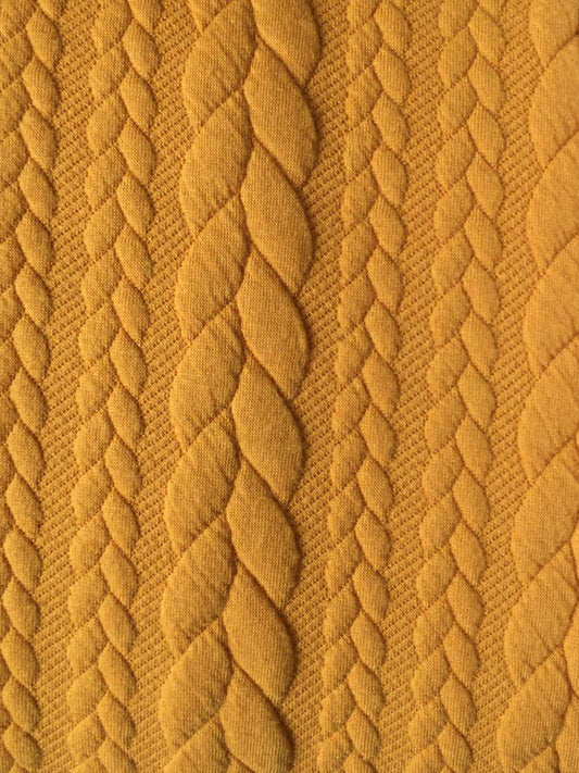 Yellow polyester and elastine cable knit image 0